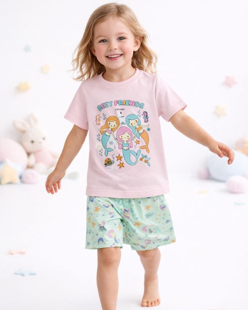 Girl in Bobonchik summer pyjamas with mermaids